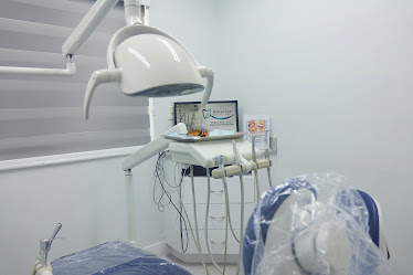 America Dental Clinic: Toirac Maria D DDS