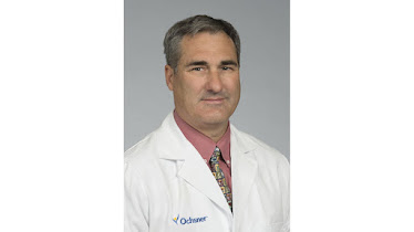 Andrew J. St Martin, MD