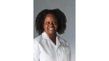 Arnita Reed , MD