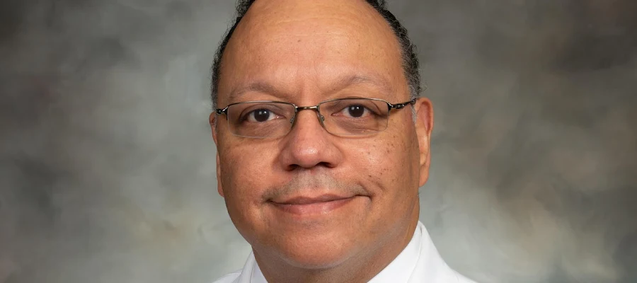 Damian Collins, MD