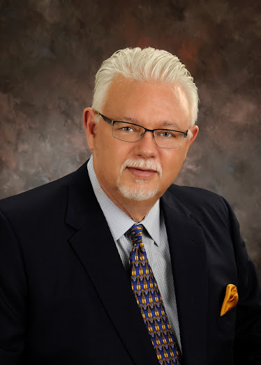 Dr. Lewis D. Gilbert, DDS