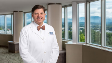 Eric Swisher, MD