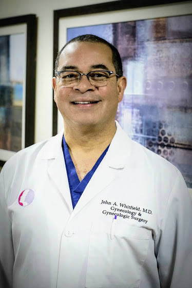 John A. Whitfield, MD