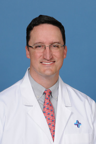 John E. Melba MD