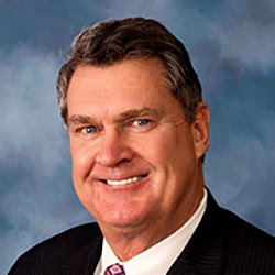 John F. Irving, MD