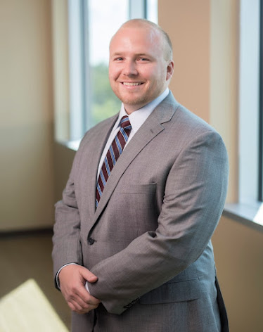 Justin W. West, M.D.