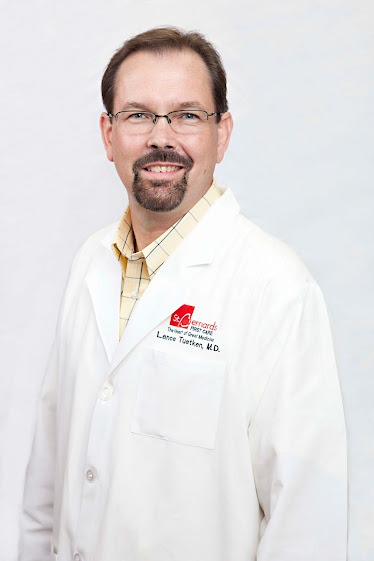Lance Tuetken, MD