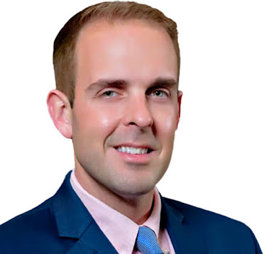 Travis Lewis, MD