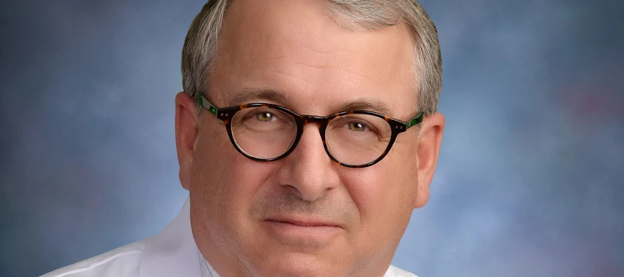 William J. Comai, DO